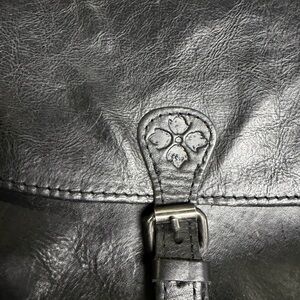 Gorgeous Patricia Nash Black Leather Saddle Bag with front and back pockets!